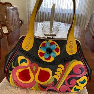 Yvette Floro, large, black leather purse with dust bag